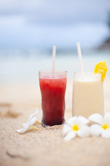 Two coctails on the tropical beach on Seychelles.