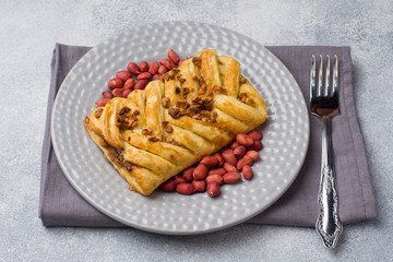 Puff pastry with peanuts and caramel filling for Breakfast.