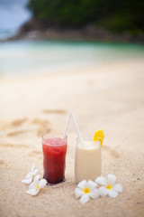 Fototapeta na wymiar Two coctails on the tropical beach on Seychelles.