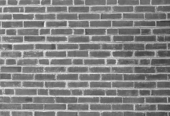 White and grey brick wall texture background with space for text. White bricks wallpaper. Home interior decoration. Architecture concept. Background for sad, hopeless and despair concept.