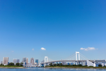 Fototapeta na wymiar Tokyo Odaiba Rainbow Bridge and blue sky