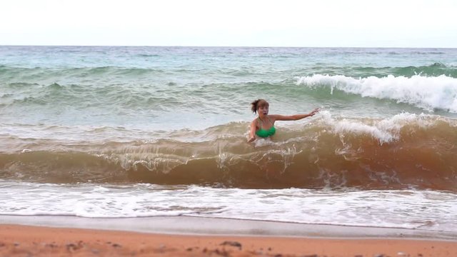 girl swimming in the sea