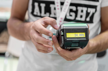 Man with POS machine getting ready to for the payment