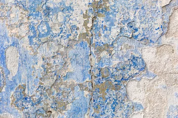Selbstklebende Fototapete Alte schmutzige strukturierte Wand Alte verwitterte Wandstruktur aus blauem Gips. Grunge-Hintergrund.