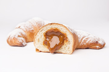 
croissant with filling on a white background