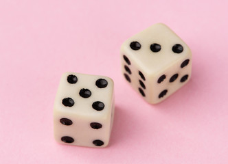 lucky dice, on pink background