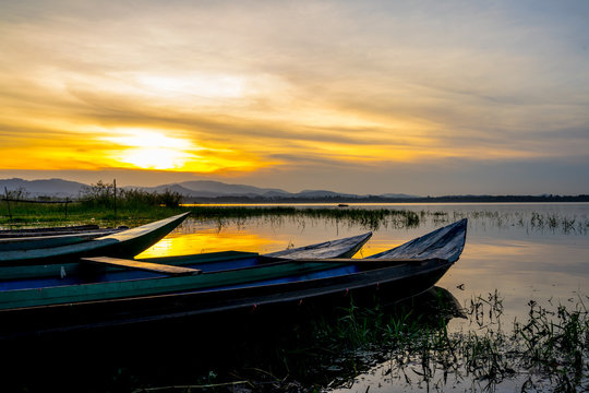 Small Fishing Boat Inside The Bang Phra Reservoir In Sunrise, Sriracha, Chonburi, Thailand