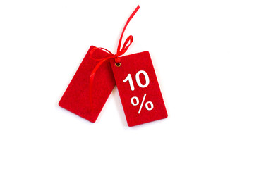 Discounted sales tags or labels isolated on white background. Copy space. Close-up.