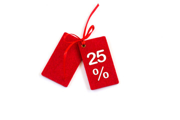 Discounted sales tags or labels isolated on white background. Copy space. Close-up.