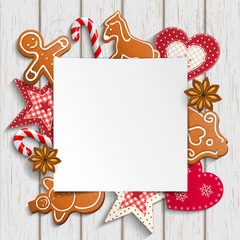 Christmas background with gingerbread and rustic ornaments