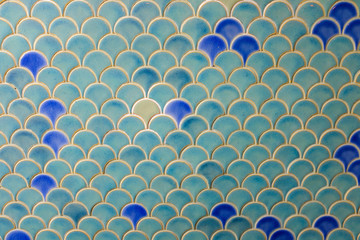 Fan shaped mosaic ceramic pattern wall background texture in blue color