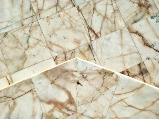 Top view of the old vintage marble tiles in different level floor design on architecture and floor decorations design concept