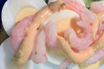 Fototapeta premium Sandwich toppings: boiled egg, shrimps and mayonnaise. Close up top view.