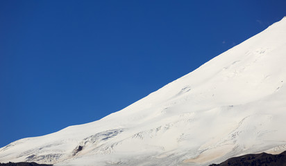 The eastern peak of Mount Elbrus is covered with snow. Caucasus Range in Russia.