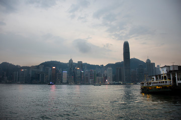 View landscape and cityscape of Kowloon island at Victoria Harbour in evening time in Hong Kong, China