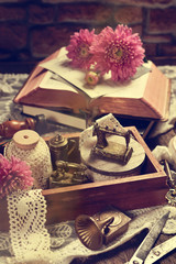 vintage style still life with collection of miniature iron stuffs