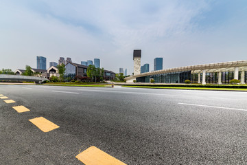 Panoramic skyline and modern business office buildings with empty road,empty concrete square floor