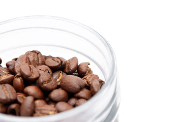 Close up Coffee Beans in a Cup Isolated on White Background with copy space