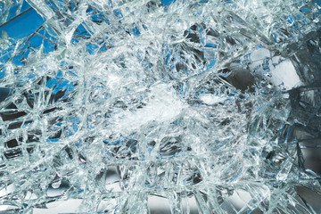 Criminal incident at the bus stop. Shooting a pistol. Hole and cracks in the glass of a city bus...