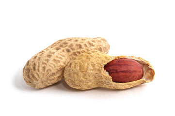 Dried peanuts on the white background.