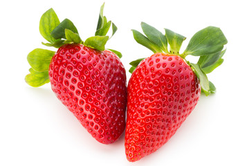 Fresh strawberries close up on white background.