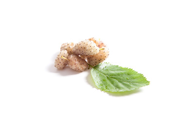 Heap of white mulberry fruit with leaf isolated on white.