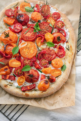 Tomato pizza with ricotta cheese.