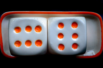 Casino cube dice set on black background.
