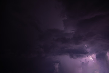 Lightning and rain clouds at night