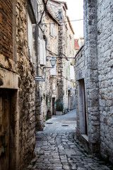 Fototapeta na wymiar Narrow streets of the mediterranean city. Sibenik. Croatia.