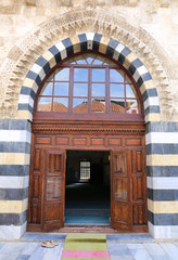 Fototapeta na wymiar Entrance Doors of the Ulucami Mosque in Adana,Turkey