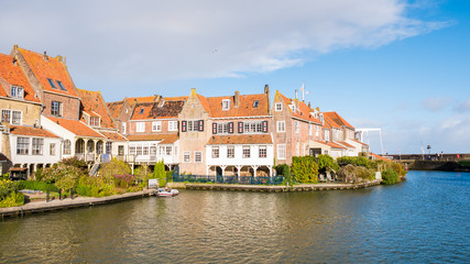 Fototapeta na wymiar Historic waterfront houses in Enkhuizen, Noord-Holland, Netherlands