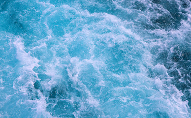 White foamy wave of ship trail. Tropical sea travel. Oceanic water texture. Cruise liner seawater trail.