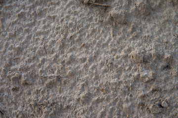 Dry fertile land with cracks under the hot sun.