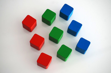Fototapeta na wymiar RGB red green blue wooden toy blocks