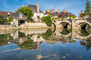 View on old bridge in a small historic French town in Loire Valley. - obrazy, fototapety, plakaty