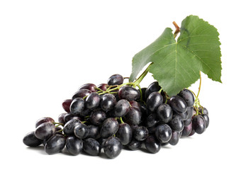 Ripe sweet grapes on white background