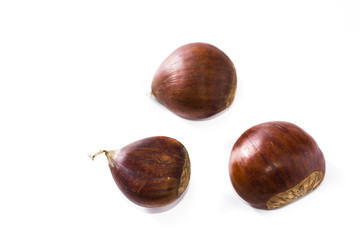 Raw chestnuts isolated on white background
