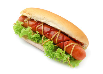 Tasty hot dog with lettuce and sauces on white background