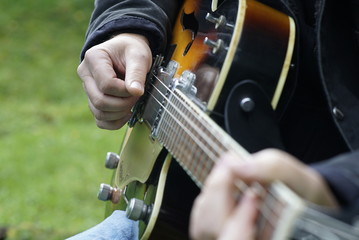 man playing guitar