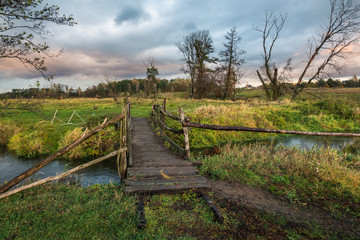 Landscape with Jeziorka river at clody day near Piaseczno, Masovia, Poland