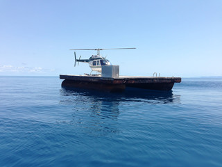 Diving at Big Barrier Reef Australia Queensland trip by helicopter over corals