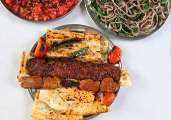 Turkish Adana and Shish Kebabs with  Onion and Tomatoes Salads