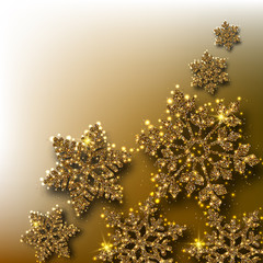 Winter, Christmas and New Year background with golden shiny snowflakes.