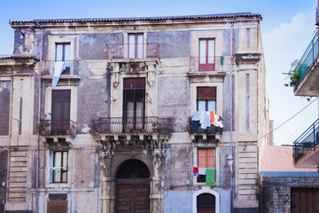 View on street of Catania, Sicily, Italy - facade of an ancient building