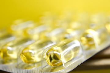 Capsules of cod liver oil in a blister pack