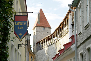 Fototapeta na wymiar Medieval city wall and entrance to the St. Catherine's Passage, Tallinn, Estonia