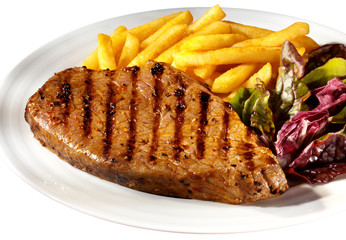 STEAK AND CHIPS ON WHITE