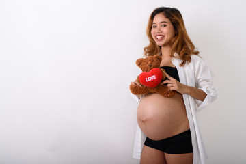 Portrait of beautiful young pregnant Asian woman