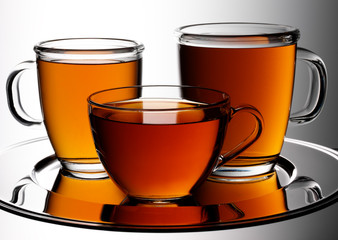 THREE TEAS IN GLASS MUGS